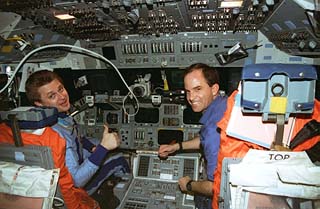 Onufriyenko/Chilton in shuttle commander & pilot seats 